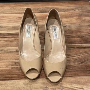 Jimmy Choo nude peep toe heels.